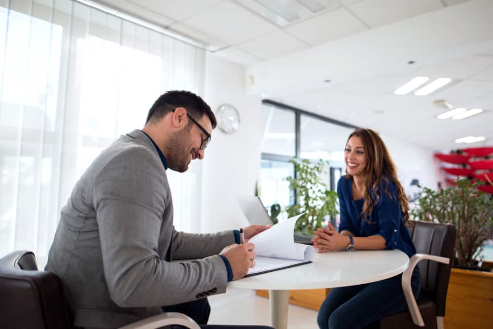 Employee Smiling thanks to Improved Candidate Experience during Recruitment