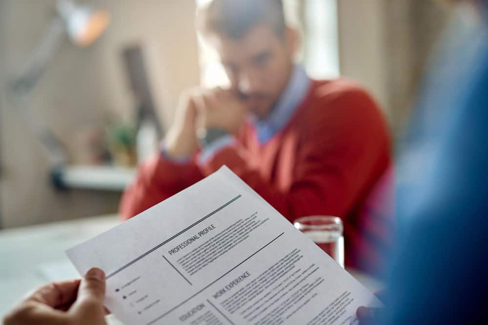 Recruiter Performing Resume Review on Technical Candidate