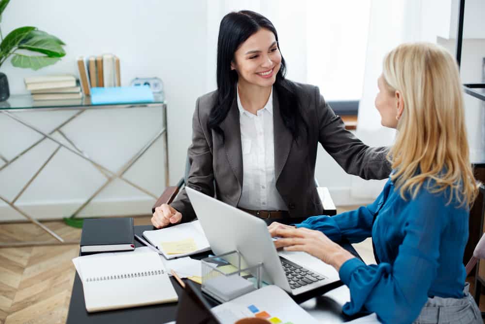 Recruitment Sepcialist Informing HR Manager of Essential Skills they need