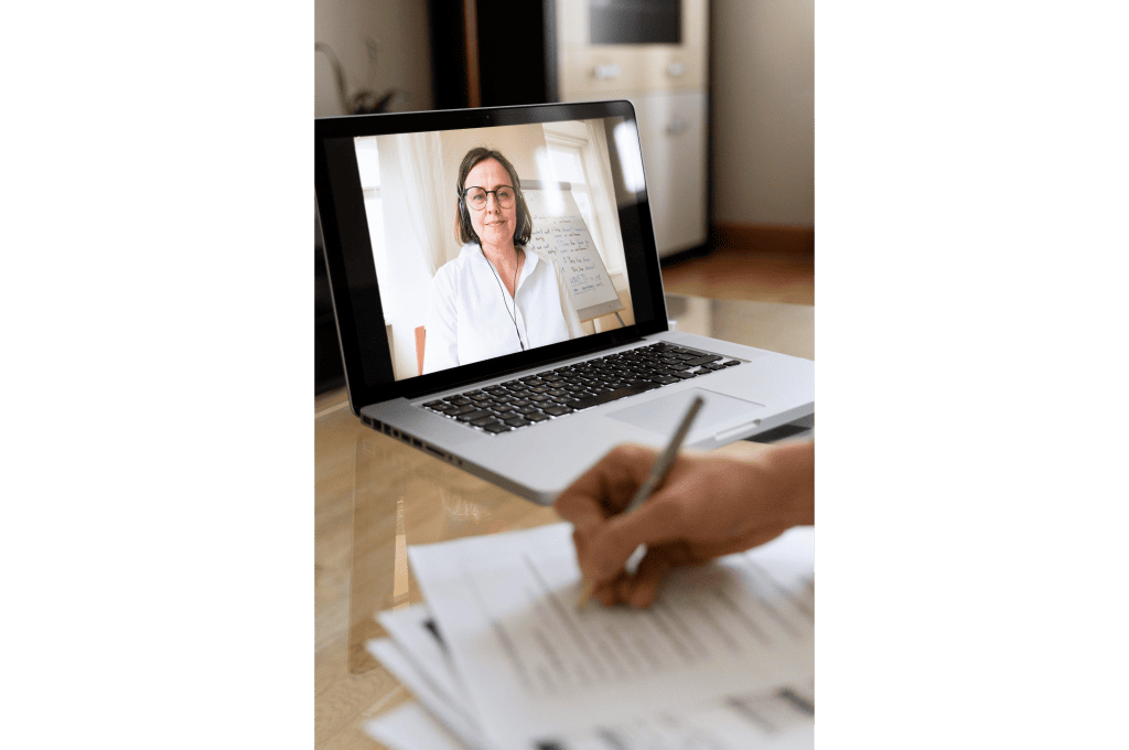 Candidate Writing Something Down During Their Online Discussion