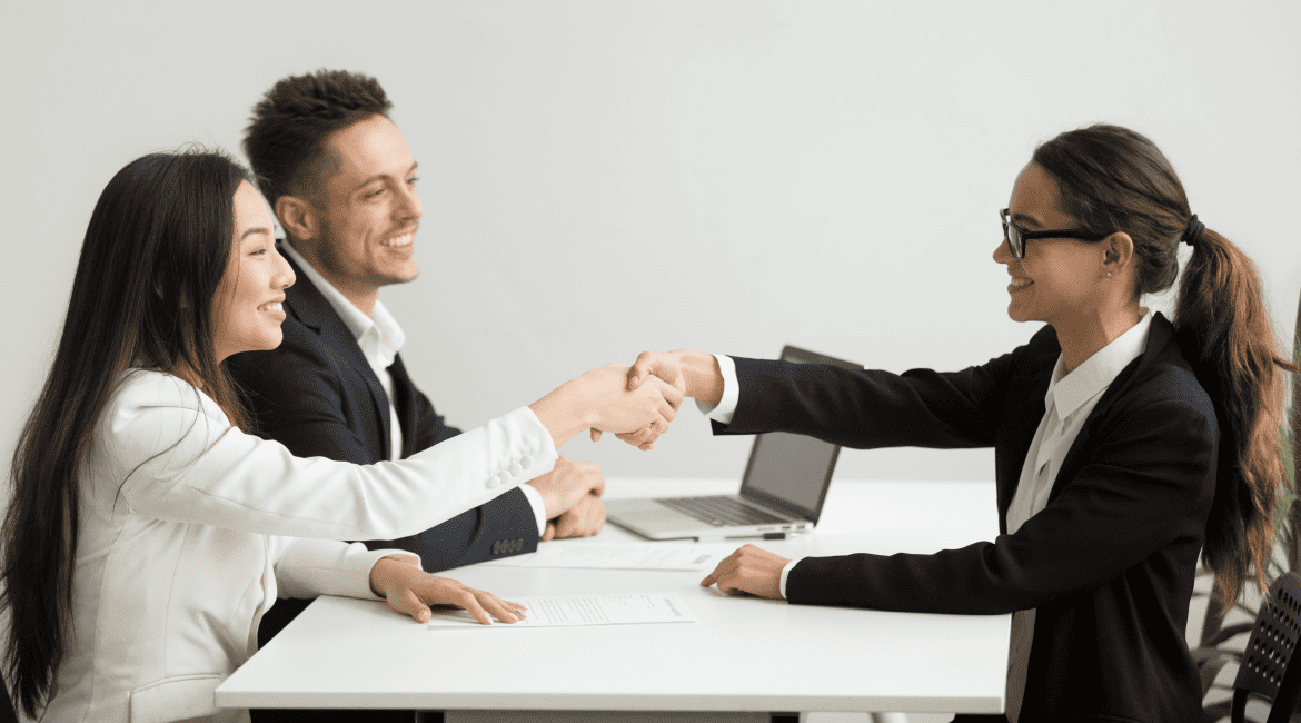 HR Manager Shaking Hands With a Candidate
