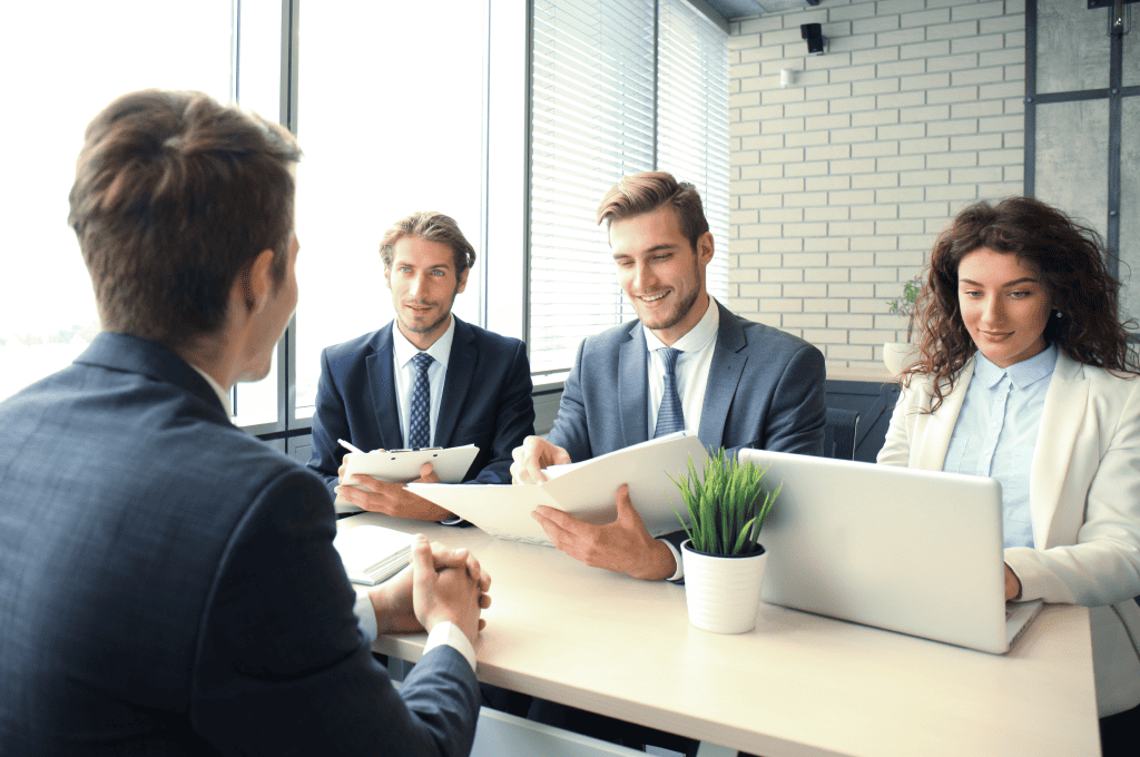 Job interview with the employer listening to candidate answers