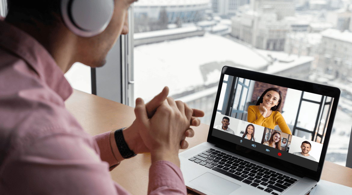 Man having an online video call with coworkers