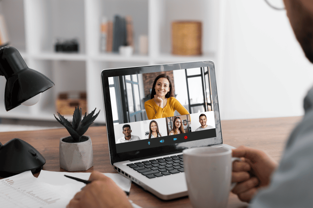 Team Meeting Held Via an Online Conference Call Laptop