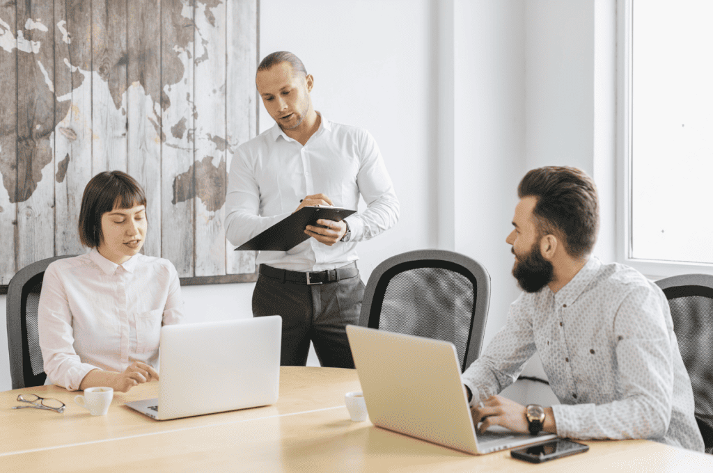 Recruitment team designing a referral program