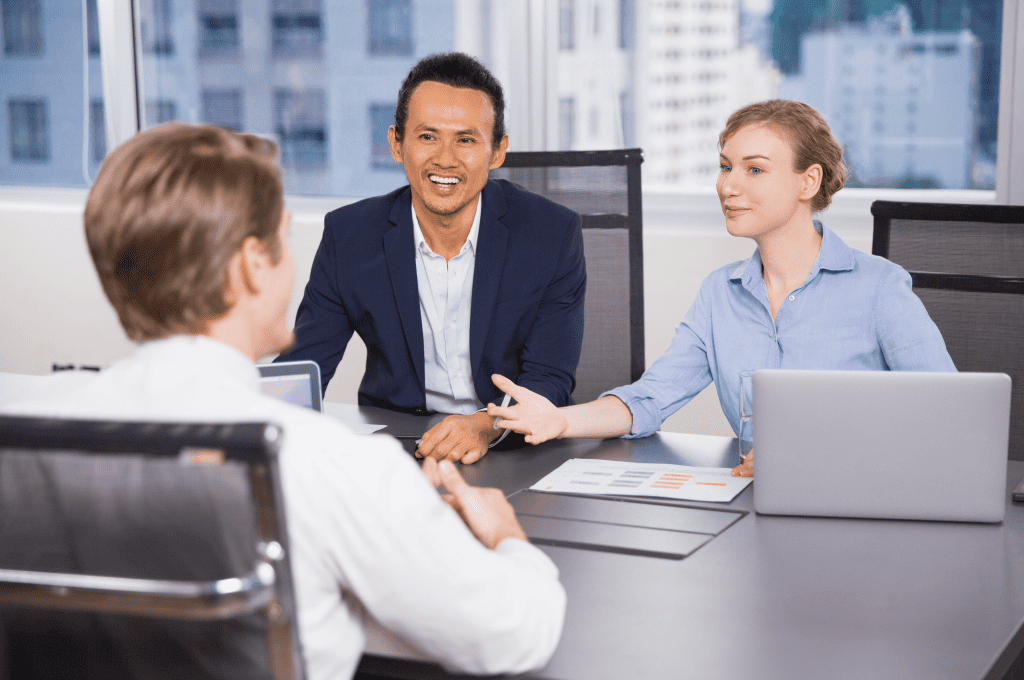 hr-team-talking-at-the-meeting-table-with-a-potentail-candidate
