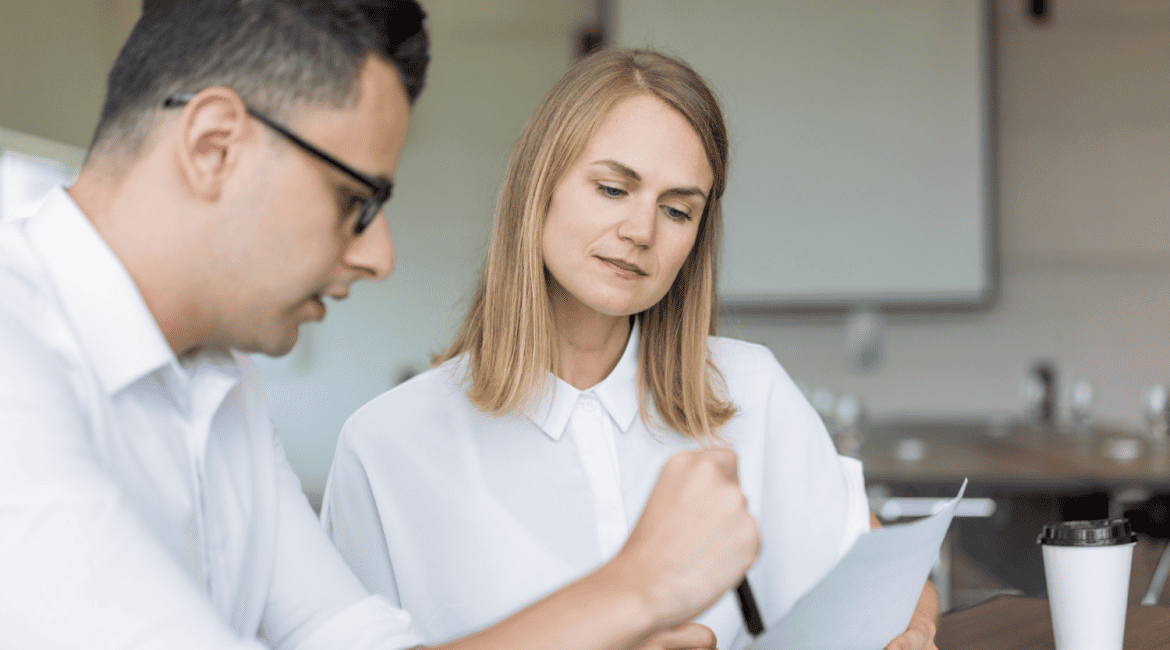 HR Manager Discusses Workplace Health Survey With Employee