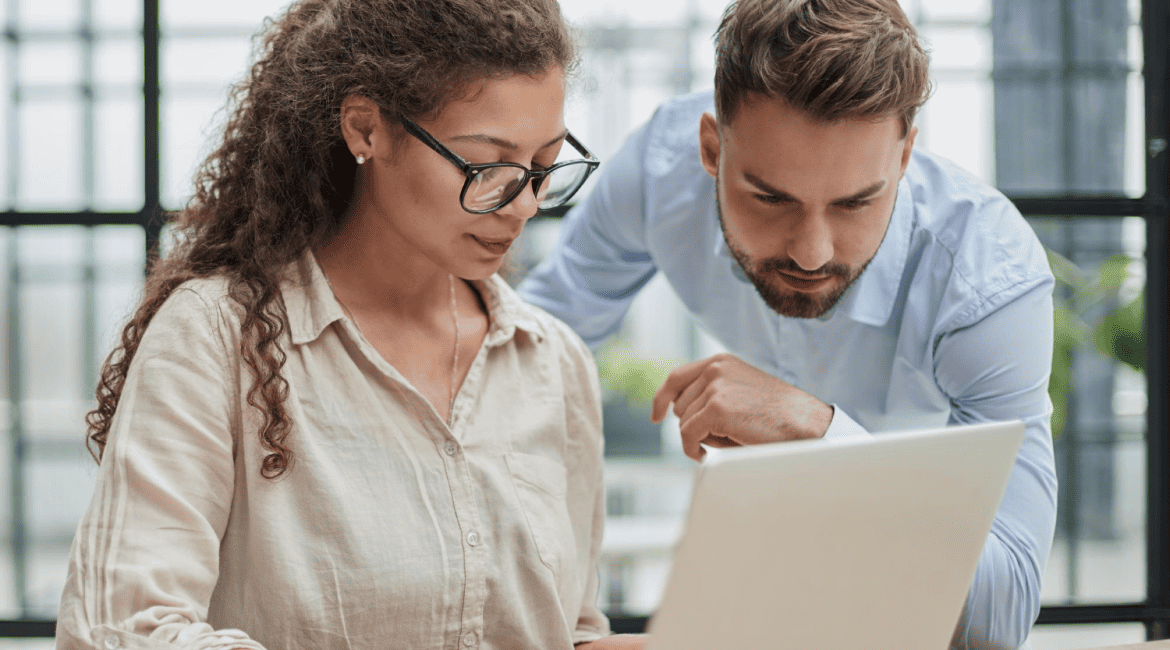 HR Manager Reviewing Applicant Resumes with an ATS System