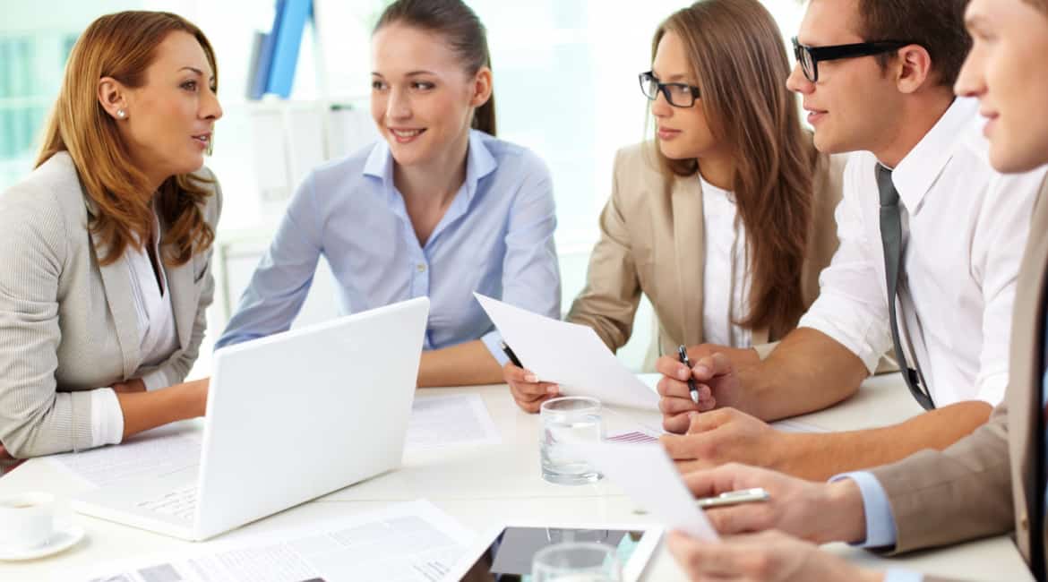 Recruitment Manager Discussing Survey Analysis Techniques