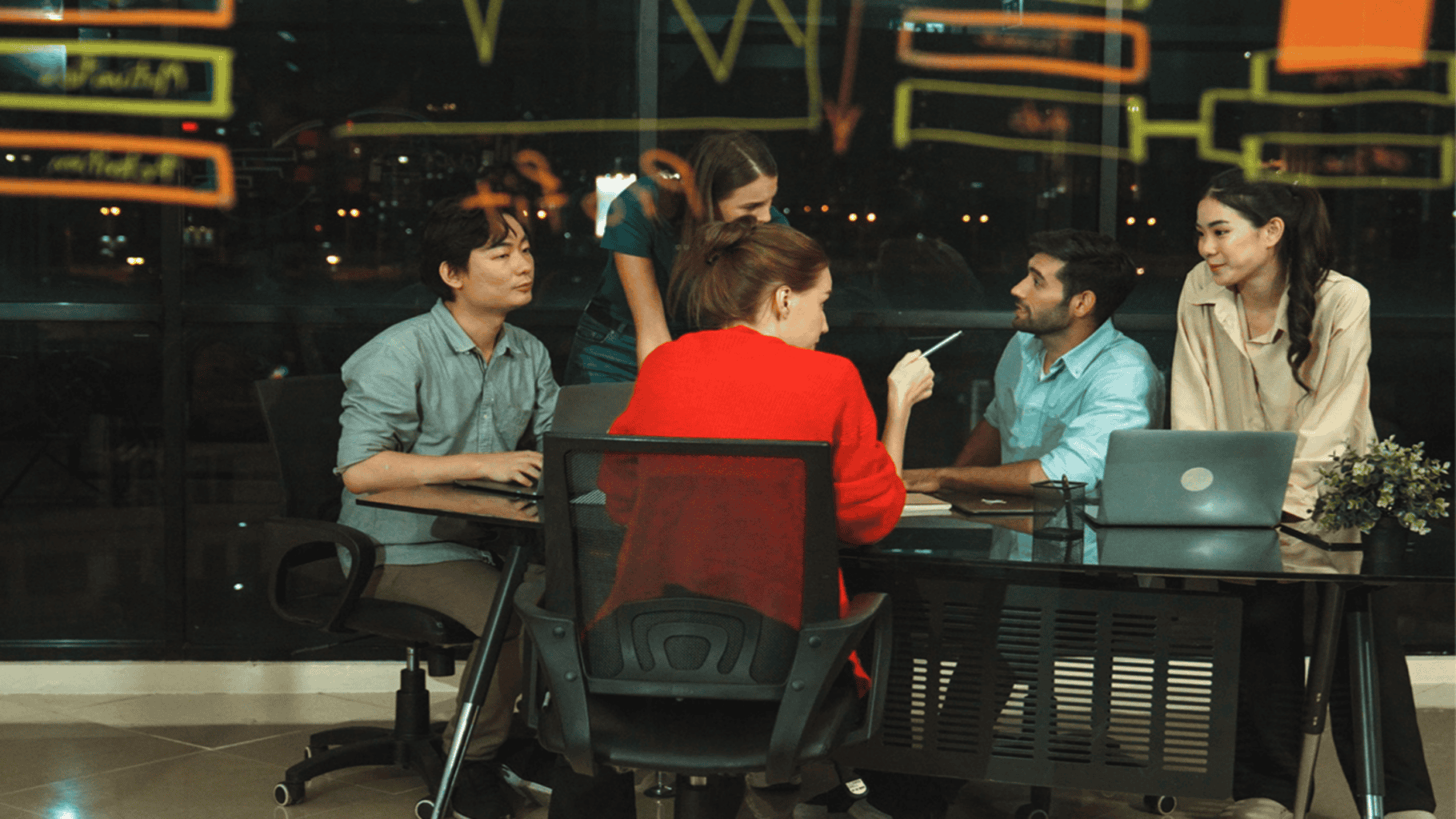 reddot workers sitting around a table